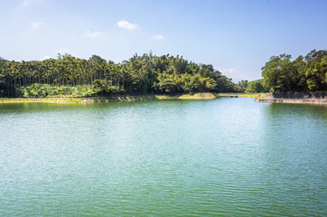 Fototapeta na wymiar pond with suspension bridge at Toushe Reservoi
