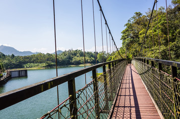 pond with suspension bridge at Toushe Reservoi
