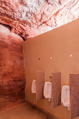 Cave public bathroom in the ancient city Petra, Jordan