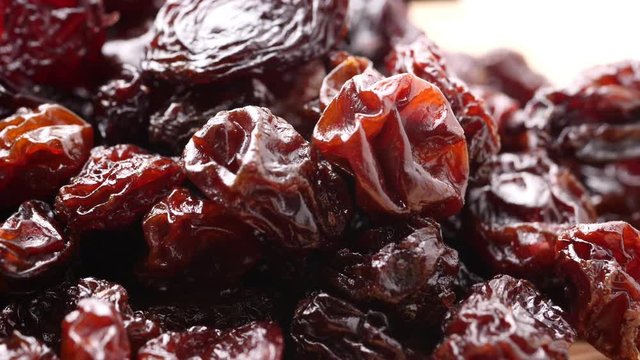 Close up of black sweet raisins or dried sweet grapes.