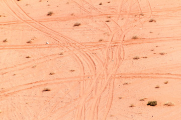 Aerial view of tire track in a desert