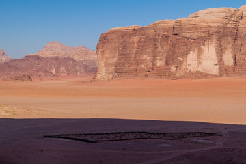 Rocks and an old village cemetery in Wadi Rum desert, Jordan