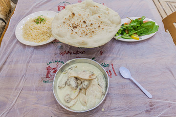 AMMAN, JORDAN - MARCH 31, 2017: Kofta tahini meal in a restaurant in Amman, Jordan