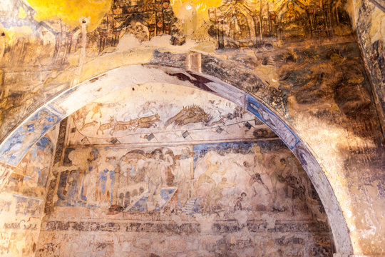 QUSAYR AMRA, JORDAN - APRIL 3, 2017: Frescoes of bathing women in Qusayr Amra (sometimes Quseir Amra or Qasr Amra), one of the desert castles located in eastern Jordan