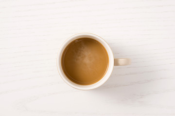 From God's Perspective, Coffee Placed on White Wooden Desktop