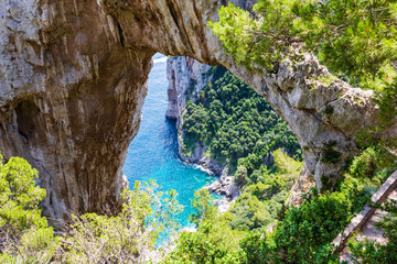 View of the Arco Naturale, a natural arch on the east coast of the island of Capri.