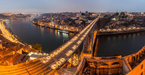 Fototapeta na wymiar Evening view of Dom Luis bridge over river Douro in Porto, Portugal