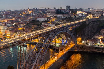 Obraz premium Evening view of Dom Luis bridge over river Douro in Porto, Portugal