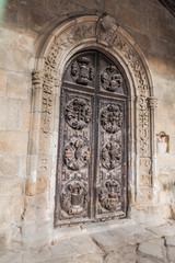 Ornate carved door in Braga, Portugal