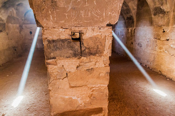 QASR KHARANA, JORDAN - APRIL 3, 2017: Light beams in a room at  Qasr Kharana (sometimes Harrana,...