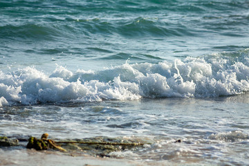waves breaking on rocks