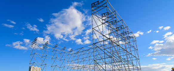 Scaffolding against the background of the sky.