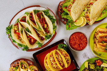 Colorful dishes from corn tortillas, taco shells with salsa.