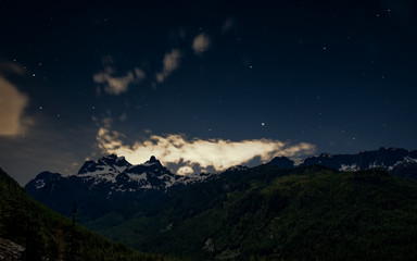 Obraz na płótnie Canvas Squamish Mountain Landscape Combined with Long Exposure Clouds and Stars