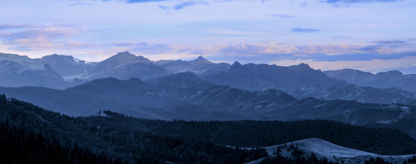 Obraz na płótnie Canvas Panoramic view of Rocky mountains in evening time