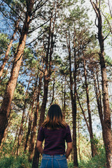 young woman in the forest