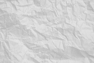 Gray crumpled paper empty background.texture of gray creased paper