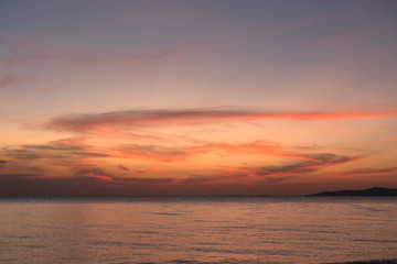 Naklejka na ściany i meble Sea pink sunset. Beautiful color clouds.