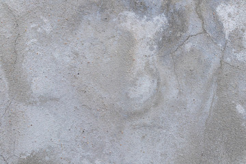 cracked concrete wall with gray cement surface