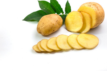 potato sliced with leaves  isolated on white background