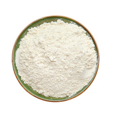 Bowl with flour on white background