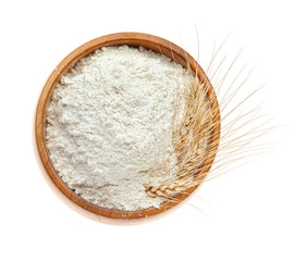 Bowl with flour on white background