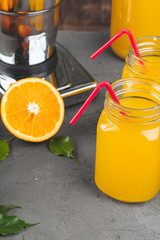 Orange juicer apparatus on kitchen table close up