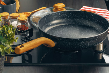 Frying pan on the gas stove in a kitchen