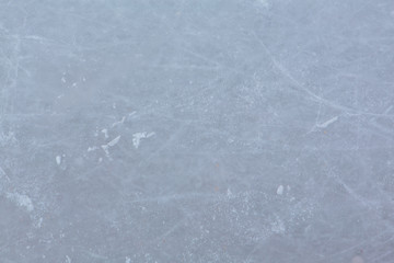 Ice hockey rink scratches surface abstract background.