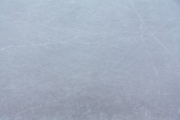 Ice hockey rink scratches surface abstract background.