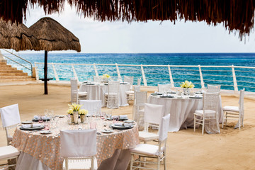 wedding table and chairs on the beach