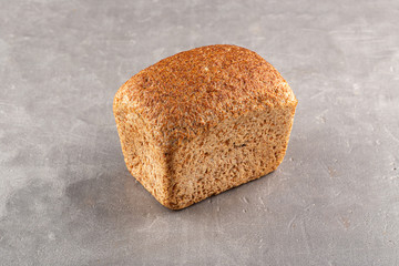 Freshly Baked Homemade Bread, close-up on a stone table