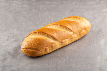 Freshly Baked Homemade Bread, close-up on a stone table