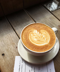 Cup of Cafe Latte on a Wooden Terraces 