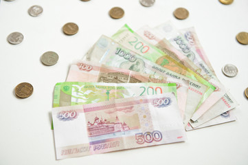 Russian money layout paper rubles and coins on a white background
