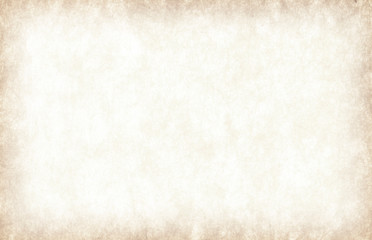 Old vintage paper with a glowing center and grunge vignette.