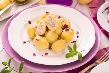 Potato gnocchi stuffed with radicchio and ricotta.