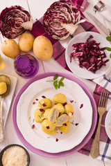 Potato gnocchi stuffed with radicchio and ricotta.