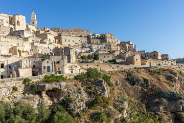 Fototapeta na wymiar View of the Sassi di Matera a historic district in the city of Matera, well-known for their ancient cave dwellings. Basilicata. Italy