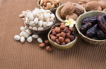 nuts or hazelnuts nuts and mix nut on a background new.