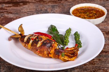 Grilled squid with sauce and hebs
