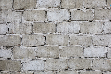 Wall of concrete blocks. Clear cement mortar. Texture, background.