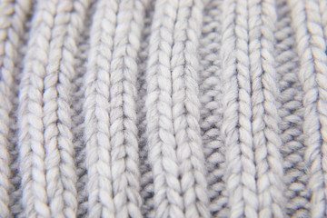 Pattern of knit stitch. Woolen hat