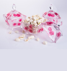 nuts or pistachios nuts on a background new.