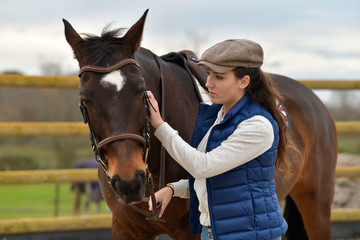 Fototapeta premium Portrait of horsewoman and horse