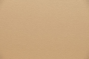 Fototapeta premium yellow rough texture cement wall. background for asian and oriental style.