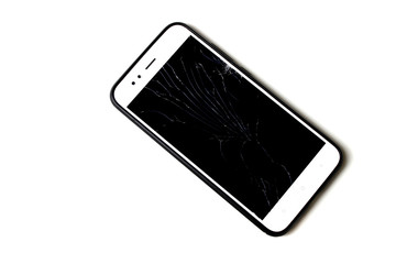 Mobile smartphone with broken screen isolated on white.
