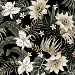 Tropical vintage night white orchid, lotus flower, palm leaves floral seamless pattern black background. Exotic jungle wallpaper.