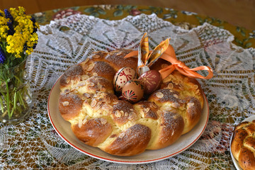  Easter cake.  Delicious Easter bread ring and home decorated eggs.  Tradicional easter food composition.