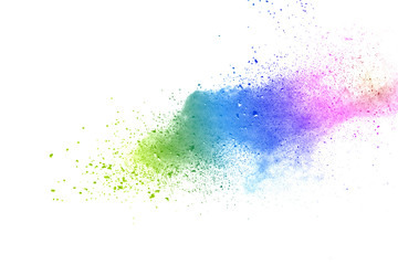 Freeze motion of colorful color powder exploding on white background.  Paint Holi.